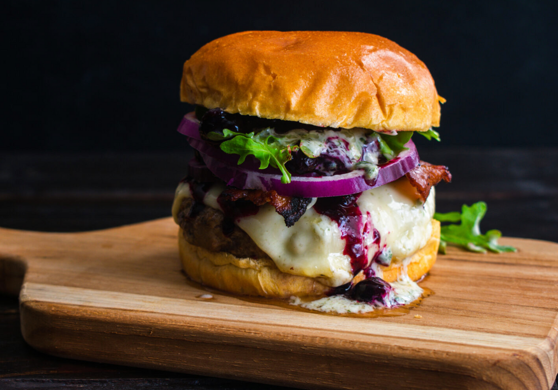 Miso-Glazed Wagyu Burger with Spicy Mayo and Caramelized Onions